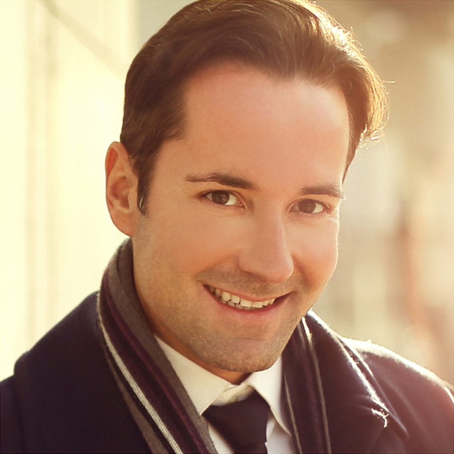 A profile picture of a white man in his early 30s with brown hair and brown eyes.