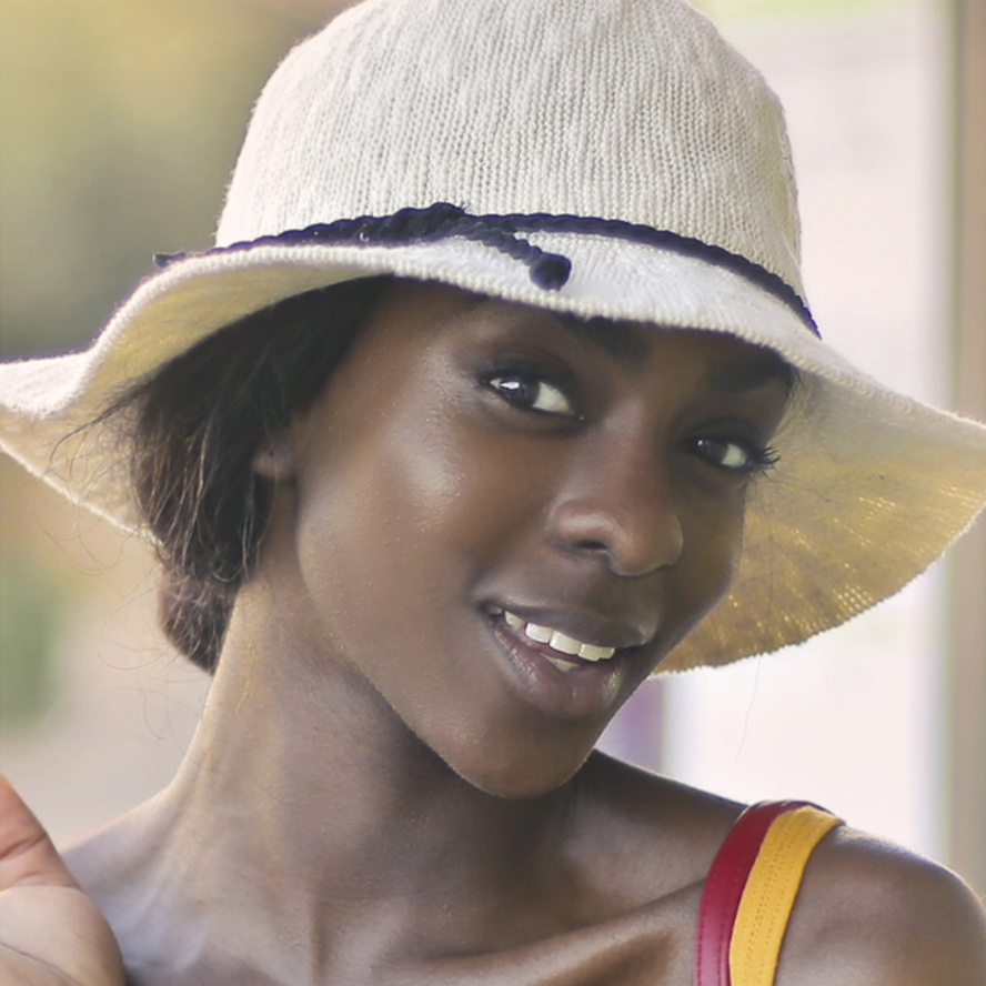 Profile picture of a white woman with short dark hair.